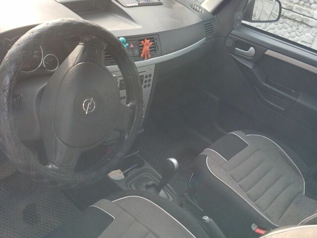 Серый Опель Мерива, объемом двигателя 1.6 л и пробегом 244 тыс. км за 4000 $, фото 6 на Automoto.ua