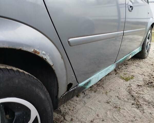 Серый Опель Мерива, объемом двигателя 1.7 л и пробегом 343 тыс. км за 1900 $, фото 4 на Automoto.ua