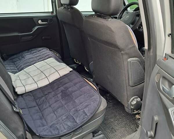 Серый Опель Мерива, объемом двигателя 1.3 л и пробегом 244 тыс. км за 3300 $, фото 9 на Automoto.ua