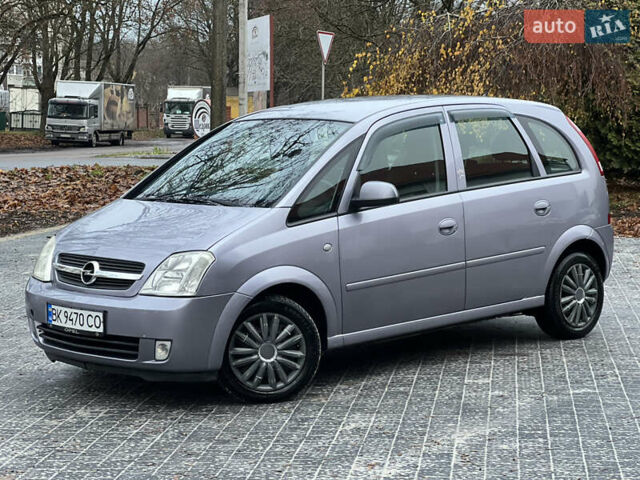 Серый Опель Мерива, объемом двигателя 1.6 л и пробегом 180 тыс. км за 3650 $, фото 1 на Automoto.ua