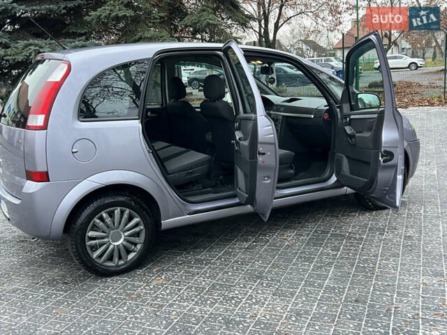 Серый Опель Мерива, объемом двигателя 1.6 л и пробегом 180 тыс. км за 3650 $, фото 34 на Automoto.ua