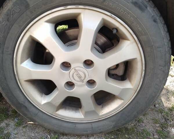 Серый Опель Мерива, объемом двигателя 1.6 л и пробегом 180 тыс. км за 3400 $, фото 14 на Automoto.ua