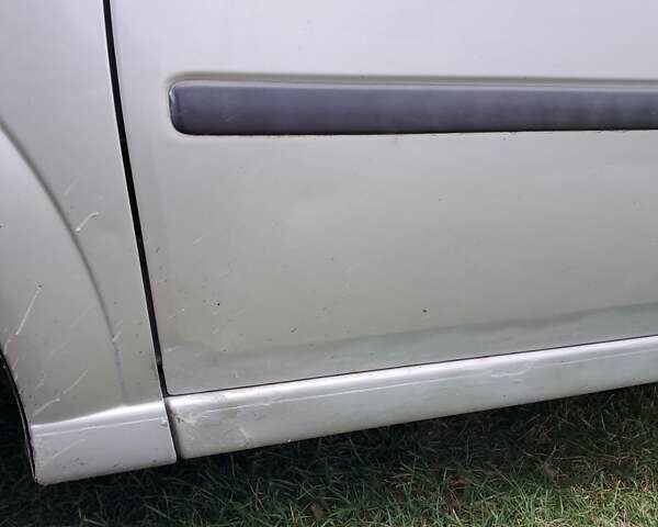 Серый Опель Мерива, объемом двигателя 1.3 л и пробегом 244 тыс. км за 3300 $, фото 11 на Automoto.ua