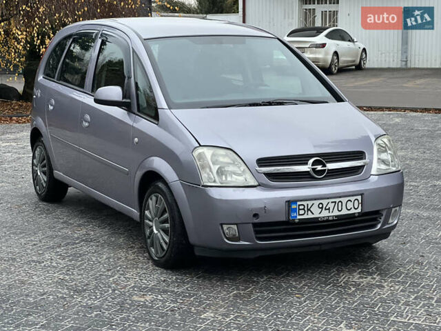 Серый Опель Мерива, объемом двигателя 1.6 л и пробегом 180 тыс. км за 3650 $, фото 38 на Automoto.ua