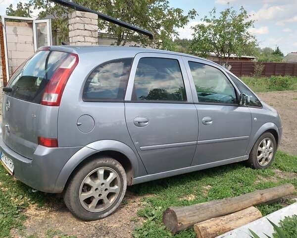 Серый Опель Мерива, объемом двигателя 1.6 л и пробегом 180 тыс. км за 3400 $, фото 3 на Automoto.ua