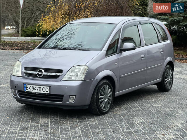 Серый Опель Мерива, объемом двигателя 1.6 л и пробегом 180 тыс. км за 3650 $, фото 36 на Automoto.ua