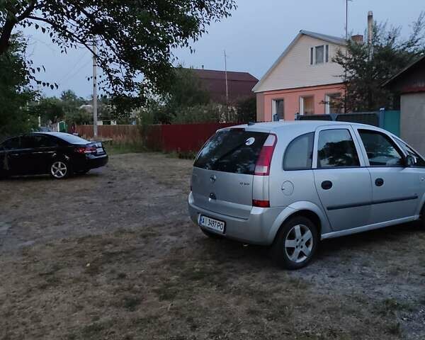 Серый Опель Мерива, объемом двигателя 1.7 л и пробегом 310 тыс. км за 3800 $, фото 1 на Automoto.ua