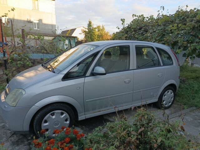 Серый Опель Мерива, объемом двигателя 1.6 л и пробегом 214 тыс. км за 3486 $, фото 13 на Automoto.ua