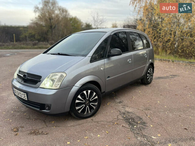 Серый Опель Мерива, объемом двигателя 1.6 л и пробегом 307 тыс. км за 3600 $, фото 25 на Automoto.ua