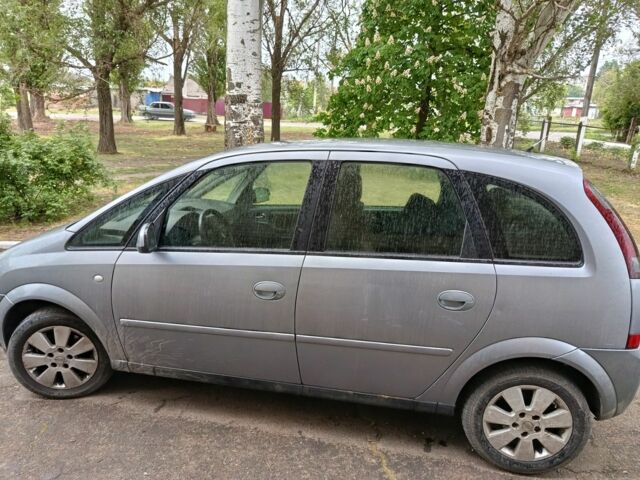 Серый Опель Мерива, объемом двигателя 1.7 л и пробегом 290 тыс. км за 1868 $, фото 6 на Automoto.ua