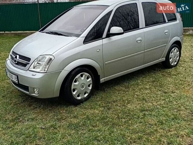 Серый Опель Мерива, объемом двигателя 1.36 л и пробегом 165 тыс. км за 5355 $, фото 2 на Automoto.ua