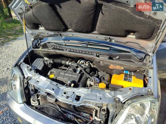 Сірий Опель Меріва, об'ємом двигуна 1.69 л та пробігом 229 тис. км за 4100 $, фото 25 на Automoto.ua