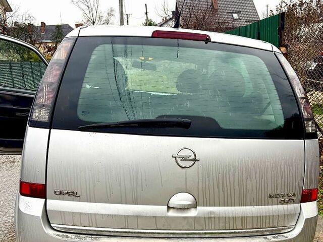 Серый Опель Мерива, объемом двигателя 1.2 л и пробегом 204 тыс. км за 4000 $, фото 2 на Automoto.ua