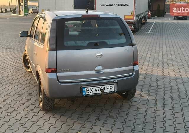 Серый Опель Мерива, объемом двигателя 1.6 л и пробегом 298 тыс. км за 4300 $, фото 3 на Automoto.ua