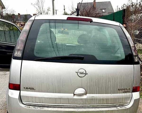 Серый Опель Мерива, объемом двигателя 1.25 л и пробегом 204 тыс. км за 4200 $, фото 4 на Automoto.ua