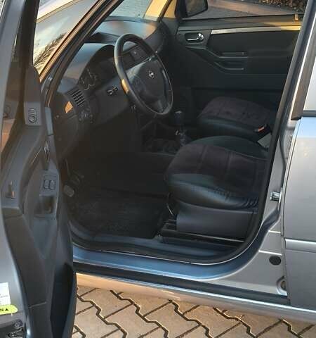 Серый Опель Мерива, объемом двигателя 1.6 л и пробегом 298 тыс. км за 4300 $, фото 5 на Automoto.ua