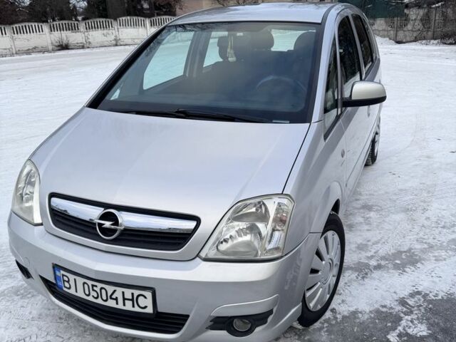 Серый Опель Мерива, объемом двигателя 1.6 л и пробегом 250 тыс. км за 4200 $, фото 2 на Automoto.ua