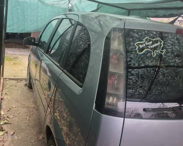 Серый Опель Мерива, объемом двигателя 1.6 л и пробегом 180 тыс. км за 5964 $, фото 2 на Automoto.ua