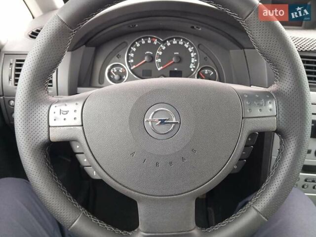 Серый Опель Мерива, объемом двигателя 1.6 л и пробегом 198 тыс. км за 6350 $, фото 48 на Automoto.ua