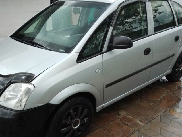 Серый Опель Мерива, объемом двигателя 1.6 л и пробегом 204 тыс. км за 2500 $, фото 1 на Automoto.ua