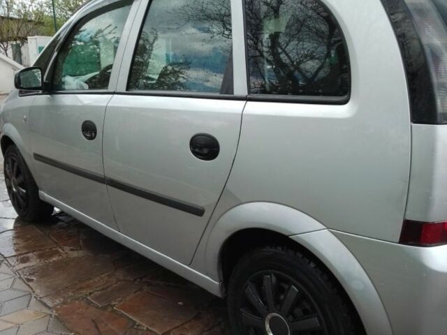 Серый Опель Мерива, объемом двигателя 1.6 л и пробегом 204 тыс. км за 2500 $, фото 2 на Automoto.ua