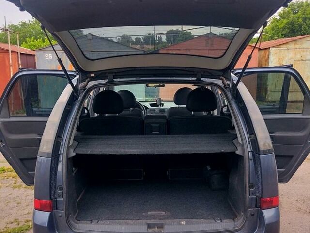 Опель Мерива 2008 в Кривом Роге на Automoto.ua Серый Опель Мерива, объемом двигателя 1.7 л и пробегом 255 тыс. км за 4000 $, фото 4 на Automoto.ua