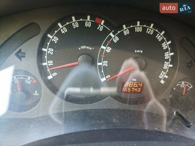 Серый Опель Мерива, объемом двигателя 1.4 л и пробегом 165 тыс. км за 5000 $, фото 21 на Automoto.ua