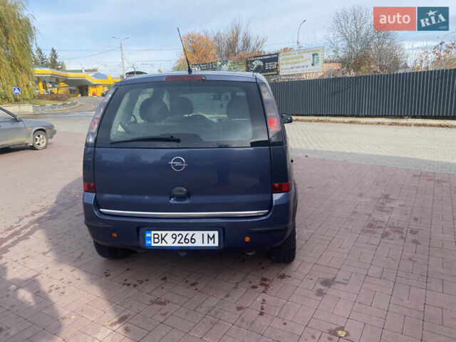 Серый Опель Мерива, объемом двигателя 1.36 л и пробегом 196 тыс. км за 2899 $, фото 7 на Automoto.ua