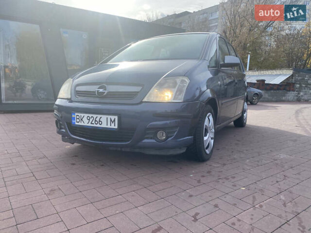 Серый Опель Мерива, объемом двигателя 1.36 л и пробегом 196 тыс. км за 2899 $, фото 5 на Automoto.ua