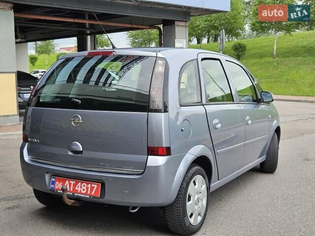 Серый Опель Мерива, объемом двигателя 1.6 л и пробегом 209 тыс. км за 3999 $, фото 16 на Automoto.ua