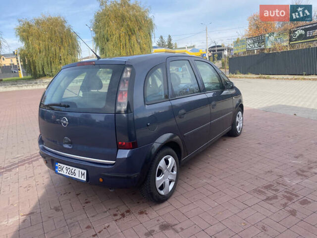 Серый Опель Мерива, объемом двигателя 1.36 л и пробегом 196 тыс. км за 2899 $, фото 6 на Automoto.ua