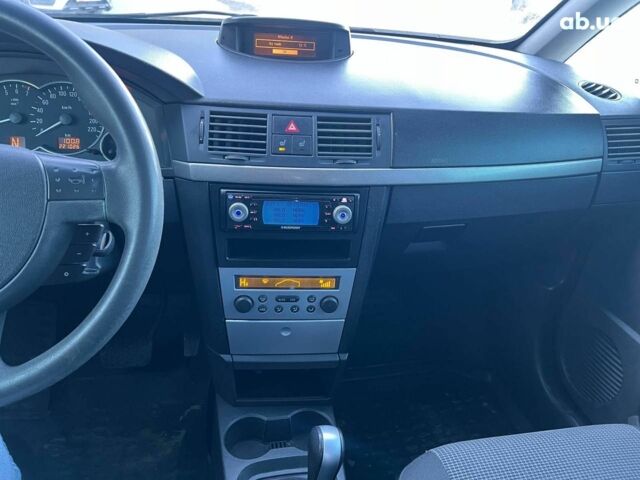 Серый Опель Мерива, объемом двигателя 1.8 л и пробегом 221 тыс. км за 5590 $, фото 26 на Automoto.ua