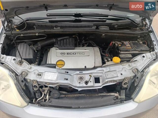 Серый Опель Мерива, объемом двигателя 1.6 л и пробегом 219 тыс. км за 4400 $, фото 22 на Automoto.ua