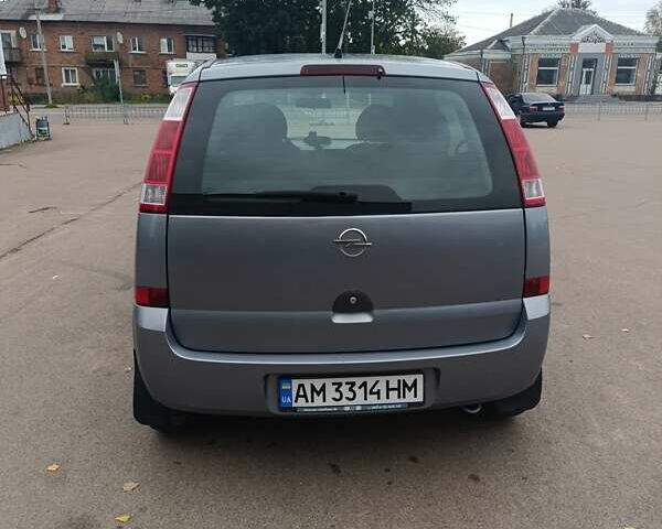 Серый Опель Мерива, объемом двигателя 1.6 л и пробегом 219 тыс. км за 4400 $, фото 6 на Automoto.ua