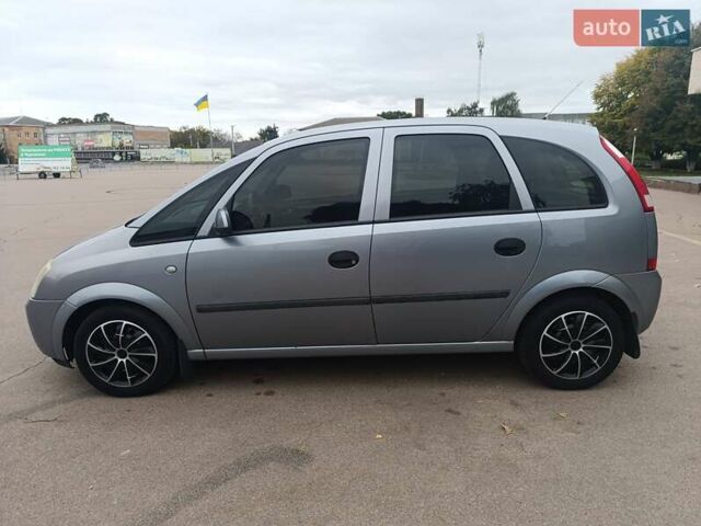 Серый Опель Мерива, объемом двигателя 1.6 л и пробегом 219 тыс. км за 4400 $, фото 3 на Automoto.ua