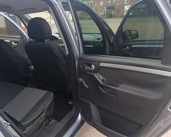 Серый Опель Мерива, объемом двигателя 1.6 л и пробегом 219 тыс. км за 4400 $, фото 18 на Automoto.ua