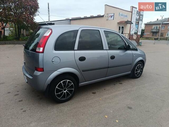 Серый Опель Мерива, объемом двигателя 1.6 л и пробегом 219 тыс. км за 4400 $, фото 4 на Automoto.ua