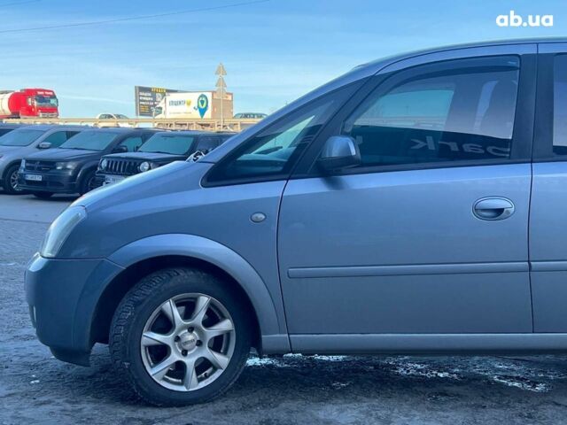 Серый Опель Мерива, объемом двигателя 1.8 л и пробегом 221 тыс. км за 5590 $, фото 3 на Automoto.ua