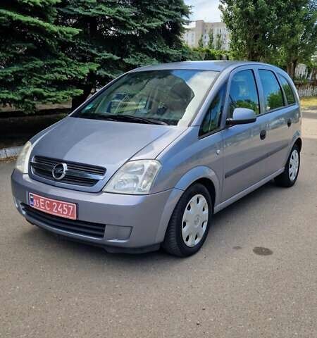 Серый Опель Мерива, объемом двигателя 1.6 л и пробегом 206 тыс. км за 4800 $, фото 2 на Automoto.ua