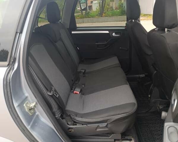 Серый Опель Мерива, объемом двигателя 1.6 л и пробегом 219 тыс. км за 4400 $, фото 19 на Automoto.ua