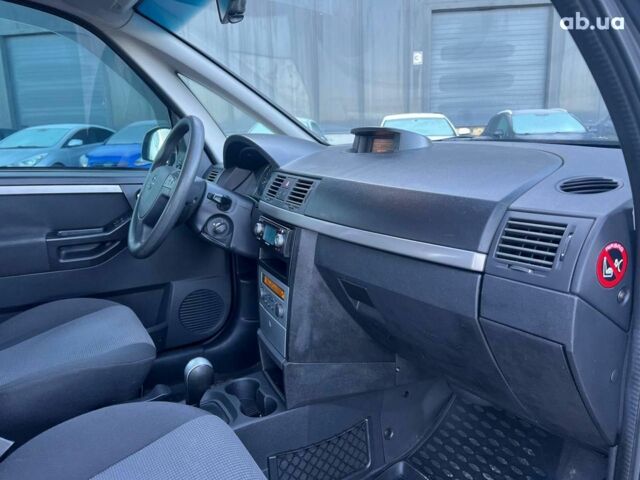 Серый Опель Мерива, объемом двигателя 1.8 л и пробегом 221 тыс. км за 5590 $, фото 38 на Automoto.ua