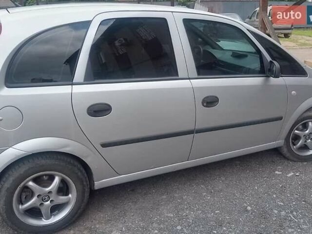 Серый Опель Мерива, объемом двигателя 1.6 л и пробегом 360 тыс. км за 4200 $, фото 2 на Automoto.ua
