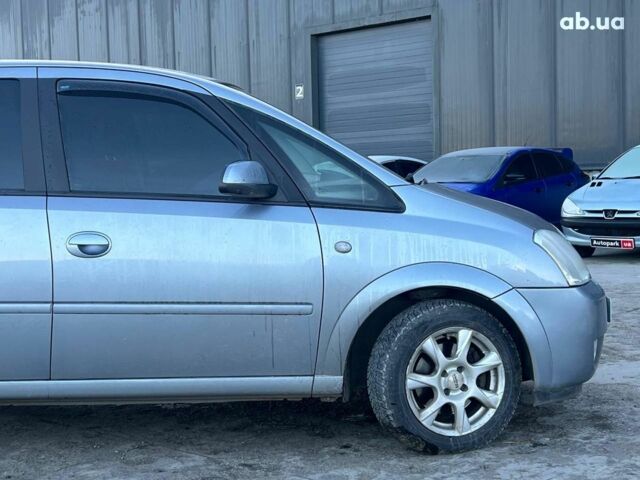 Серый Опель Мерива, объемом двигателя 1.8 л и пробегом 221 тыс. км за 5590 $, фото 11 на Automoto.ua