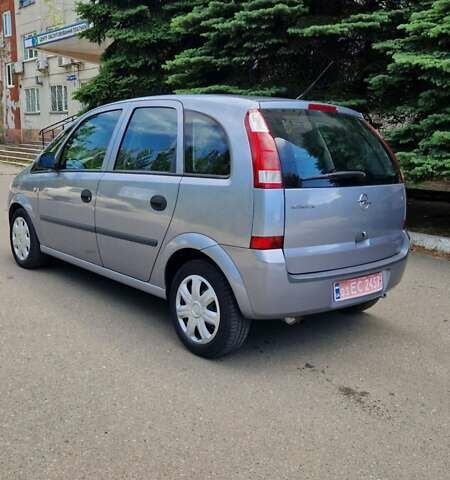 Серый Опель Мерива, объемом двигателя 1.6 л и пробегом 206 тыс. км за 4800 $, фото 6 на Automoto.ua