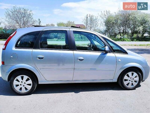 Серый Опель Мерива, объемом двигателя 1.6 л и пробегом 237 тыс. км за 4100 $, фото 1 на Automoto.ua