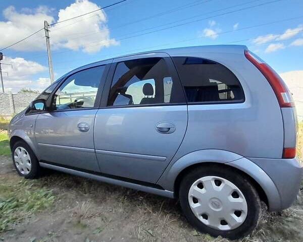 Серый Опель Мерива, объемом двигателя 1.6 л и пробегом 166 тыс. км за 4900 $, фото 23 на Automoto.ua