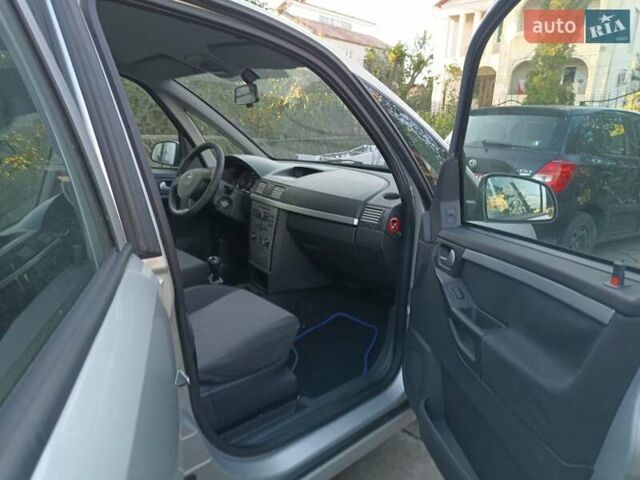 Серый Опель Мерива, объемом двигателя 1.6 л и пробегом 214 тыс. км за 3798 $, фото 38 на Automoto.ua