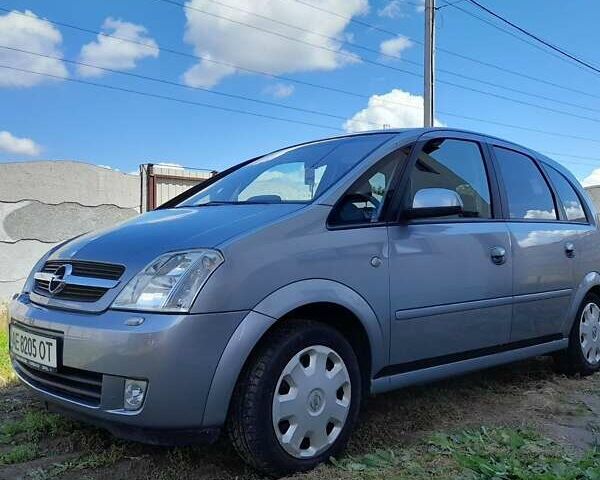 Серый Опель Мерива, объемом двигателя 1.6 л и пробегом 166 тыс. км за 4900 $, фото 32 на Automoto.ua