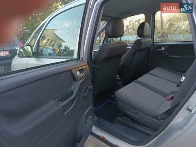 Серый Опель Мерива, объемом двигателя 1.6 л и пробегом 214 тыс. км за 3798 $, фото 32 на Automoto.ua