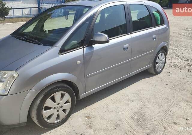 Серый Опель Мерива, объемом двигателя 1.6 л и пробегом 237 тыс. км за 4100 $, фото 6 на Automoto.ua